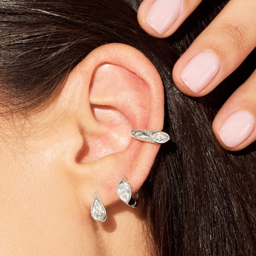 Teardrop Crystal Huggie Hoop Earrings in Gold and Silver Finish